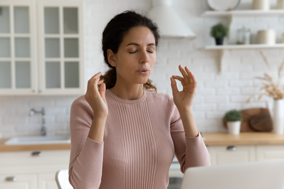 woman doing breathing exercises