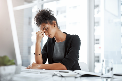 woman with anxiety at desk